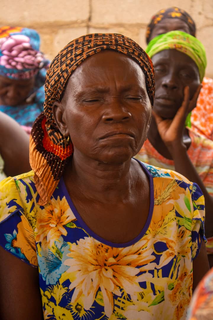 Community members listening during the Lifecycle Care programme
